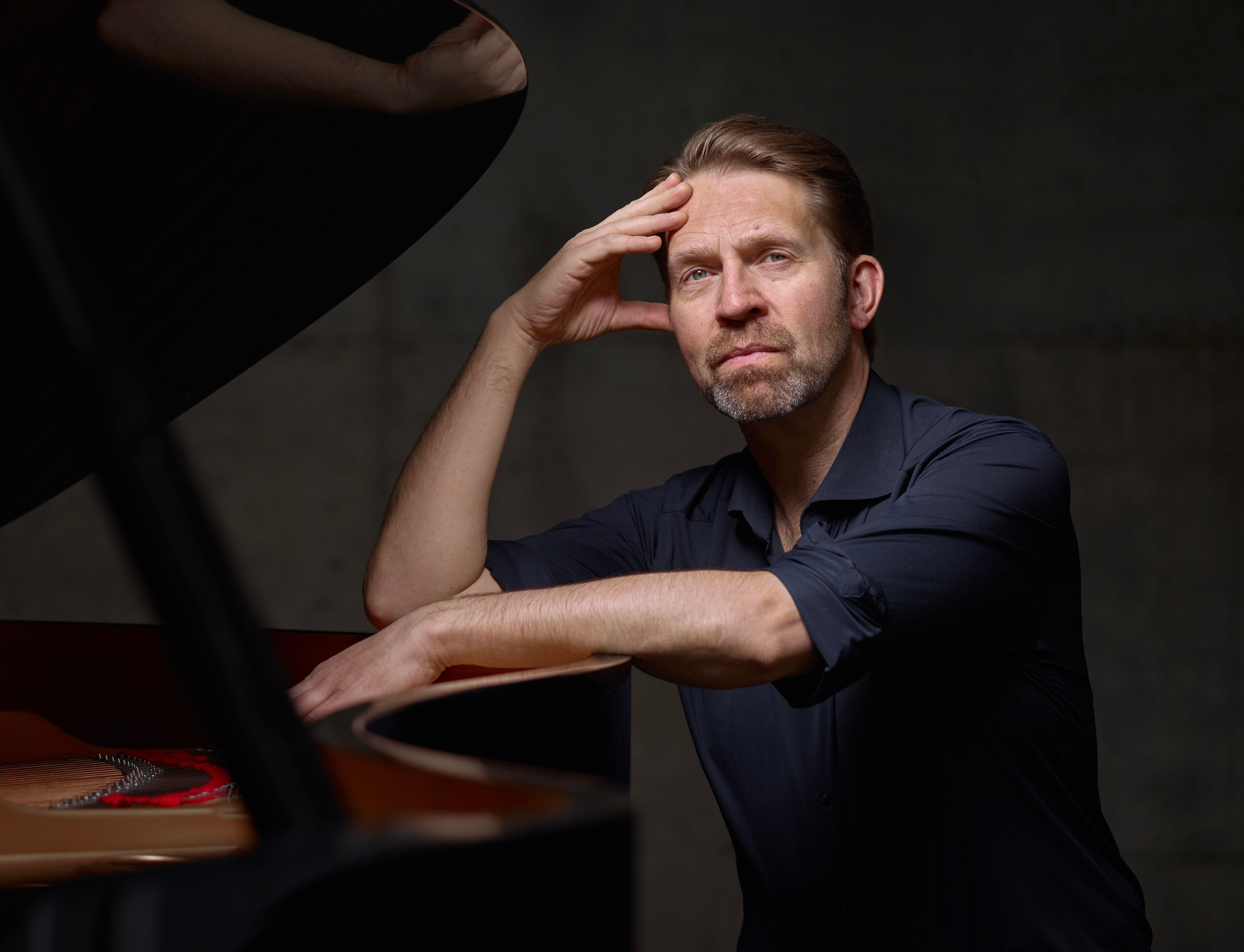 Leif Ove Andsnes sitting at a grand piano.